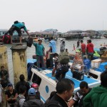 Crew unloading baggage