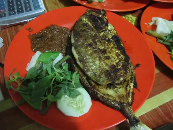 Ikan bakar, grilled fresh fish, on the charcoal grill.