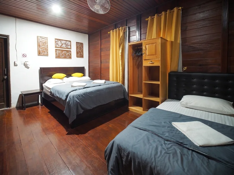 Comfortable living and sleeping area in the standalone chalet, offering extra privacy.