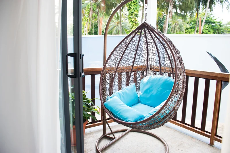Private balcony overlooking the resort's lush gardens or the Celebes Sea.