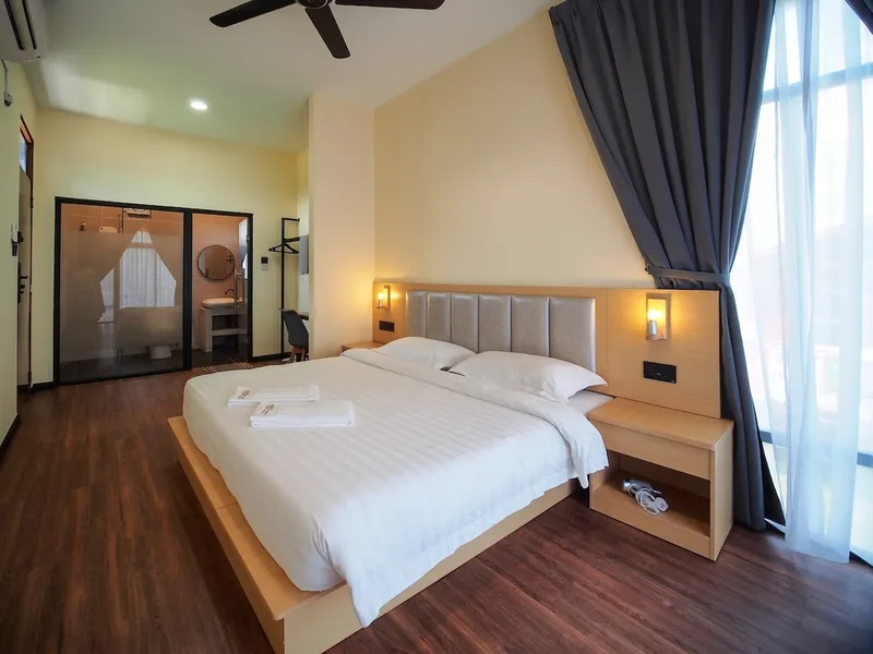 Each unit features comfortable seating and easy access to the resort's shaded garden paths.