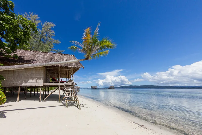Exclusive over-water Deluxe cottage positioned for ultimate privacy and sea views.