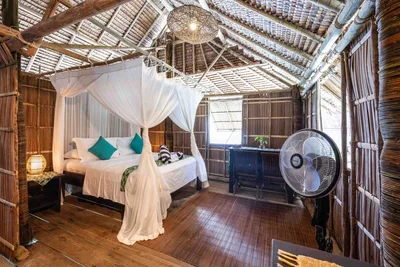 Bright and spacious Superior bedroom area with stunning lagoon views.