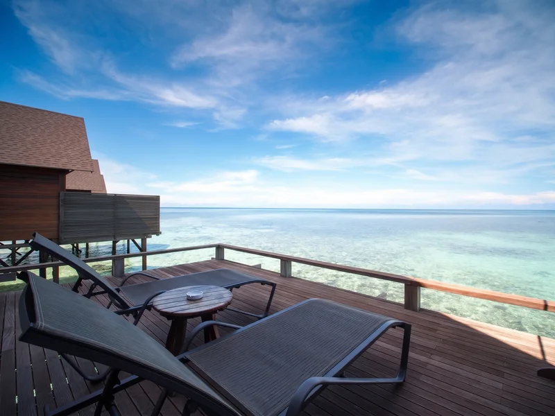Relaxing balcony area extended over the crystal clear Sulu Sea.