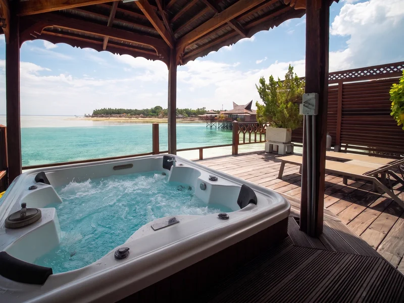 Private overwater jacuzzi for a refined rejuvenation experience.