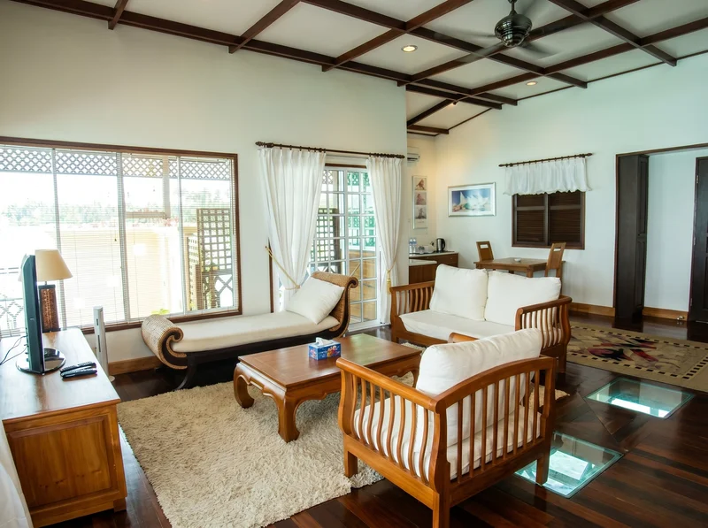 Sophisticated living space featuring a glass floor for ocean observation.