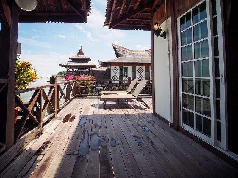 Large private balcony with direct views of the turquoise Celebes Sea.