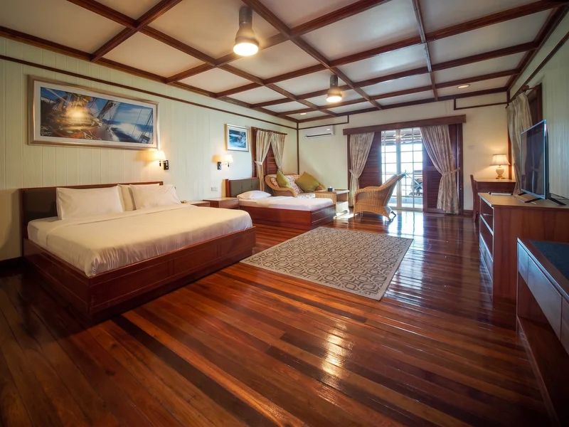 Elegant wooden interior of the signature water bungalow.