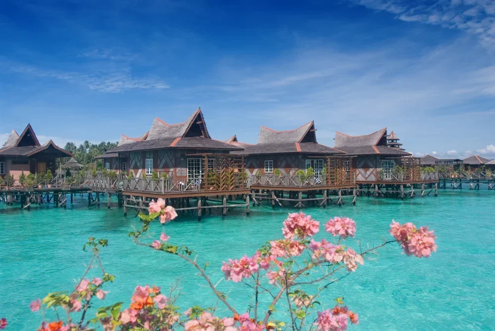 Mabul Water Bungalows provides a serene, sophisticated escape over the turquoise waters of Mabul.