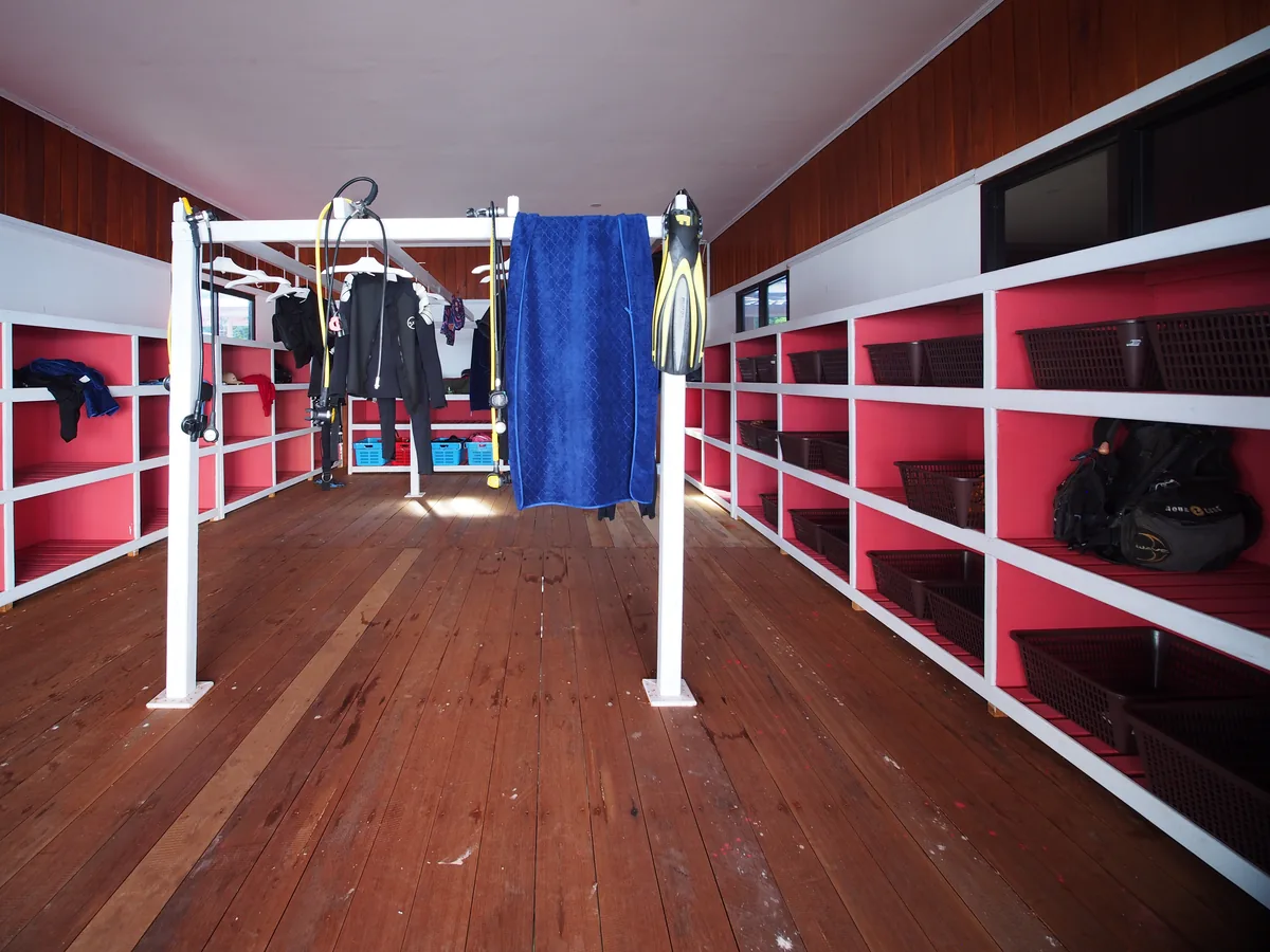 Shelving and hanging rails for dive gear inside the dive centre.