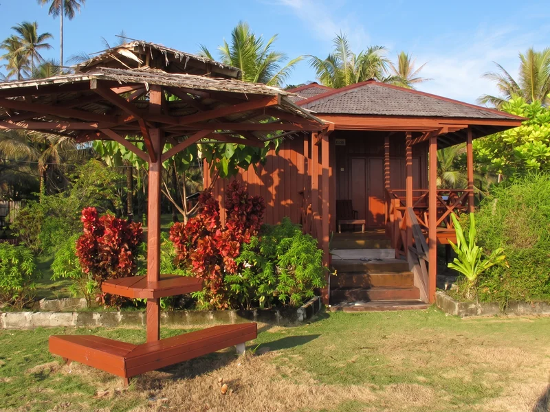 Private entrance to the Beach Chalet with a small veranda overlooking the garden.