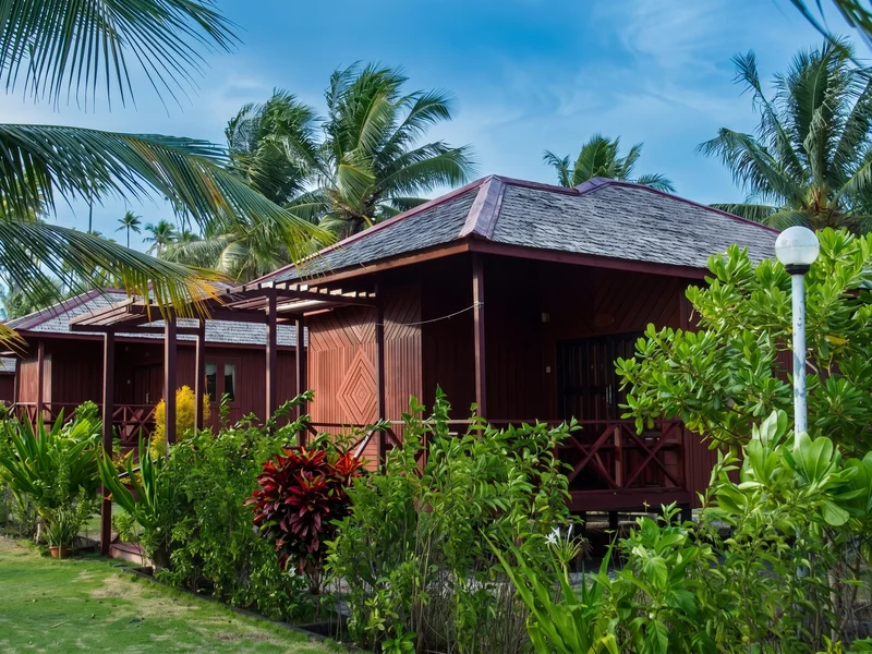 A row of Beach Chalets nestled along the shoreline of Maratua Island.