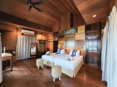 Peaceful Garden Villa interior surrounded by tropical greenery.