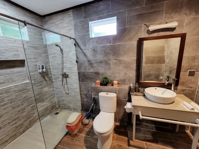 Modern ensuite bathroom in the spacious Seaview Villa category.