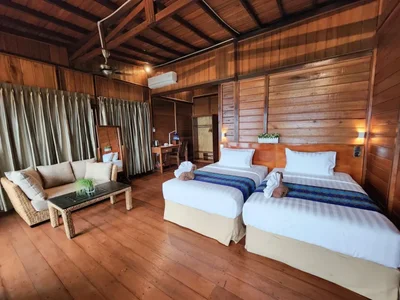 Spacious Seaview Villa bedroom with a large double bed.