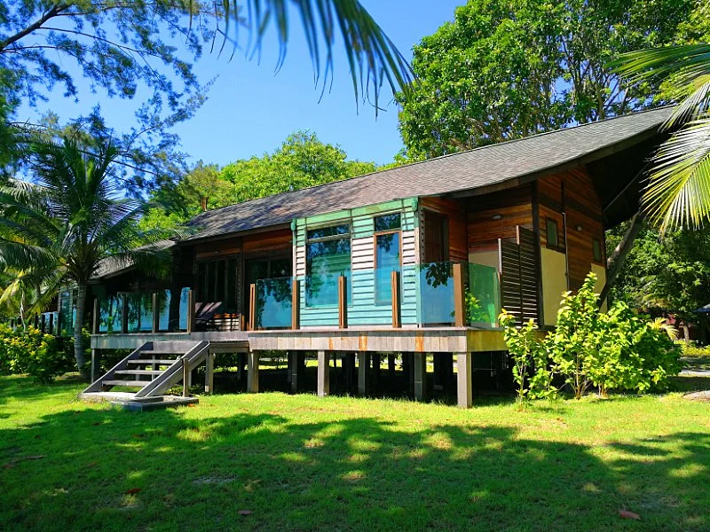 Standalone beach chalet exterior with traditional wooden design.