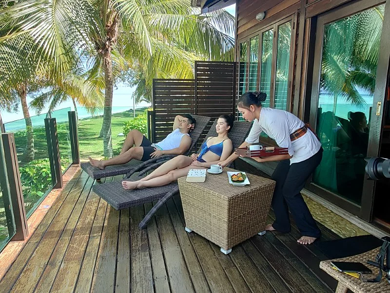 Comfortable seating area on the private beach chalet deck.