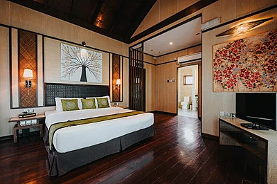 Beach Chalet featuring a double bed and stunning sea views.