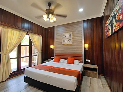 Bright and airy interior of a Garden View Deluxe room.