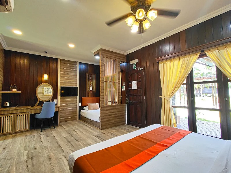 Well-appointed master bedroom catching the morning sun.