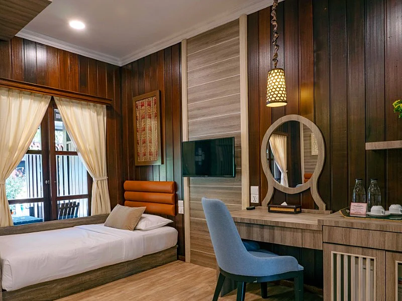 Traditional Malaysian decor in the Garden View East bedroom.