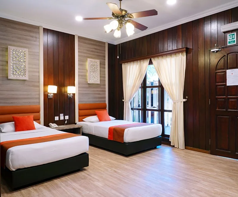 Garden View Deluxe room configured with twin beds.