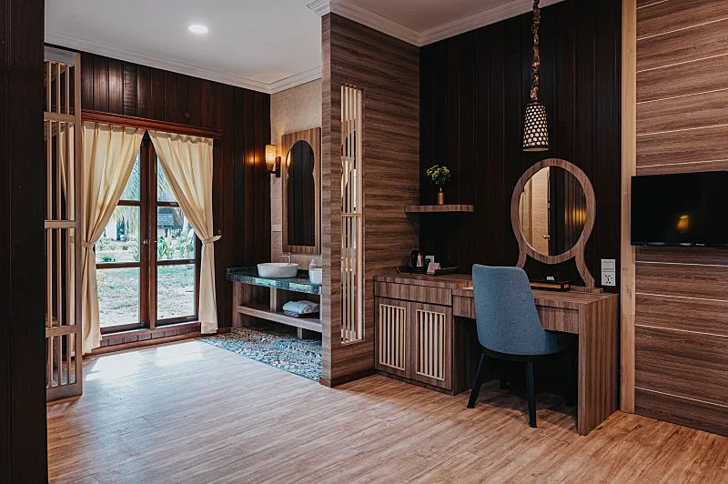 Practical and clean dressing and storage area in the Garden View room.