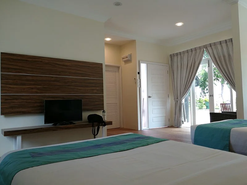 Well-maintained bedroom designed for up to three adults.