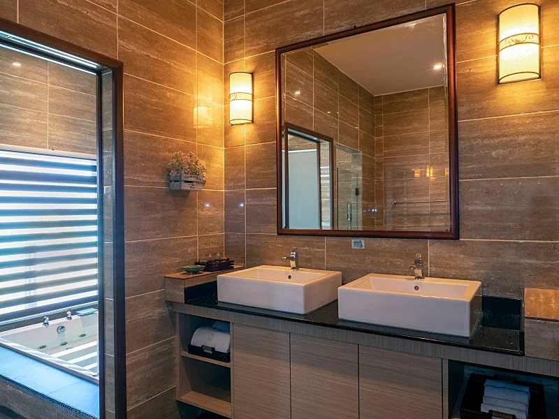 Clean and modern wash area within the semi-detached chalet.
