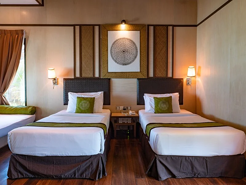 Comfortable bedroom area with immediate beach access.