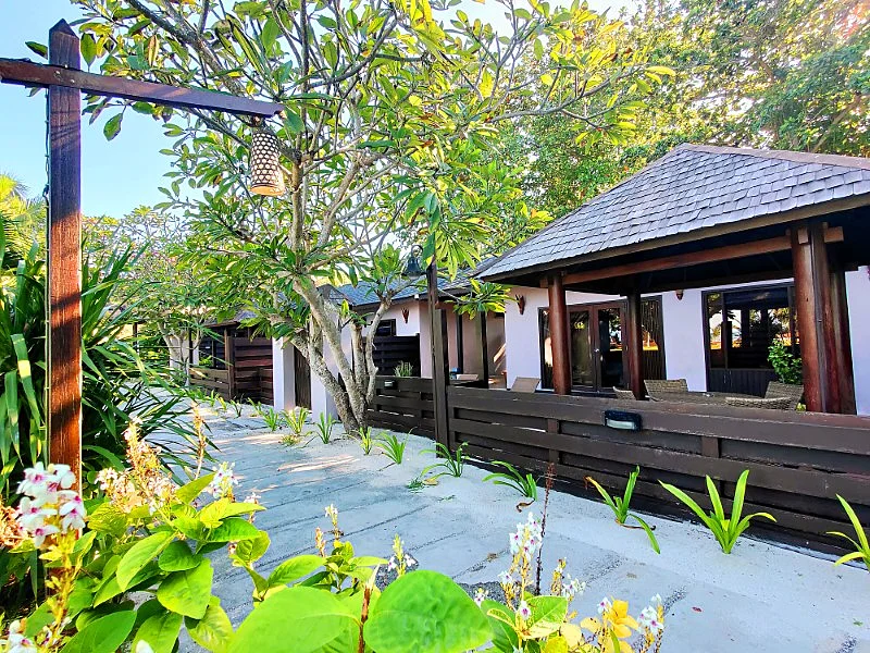 Luxurious standalone beach house exterior with modern amenities.