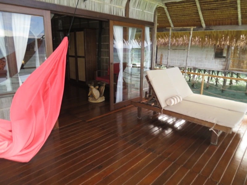 Private over-water balcony with stunning views of the Raja Ampat lagoon.