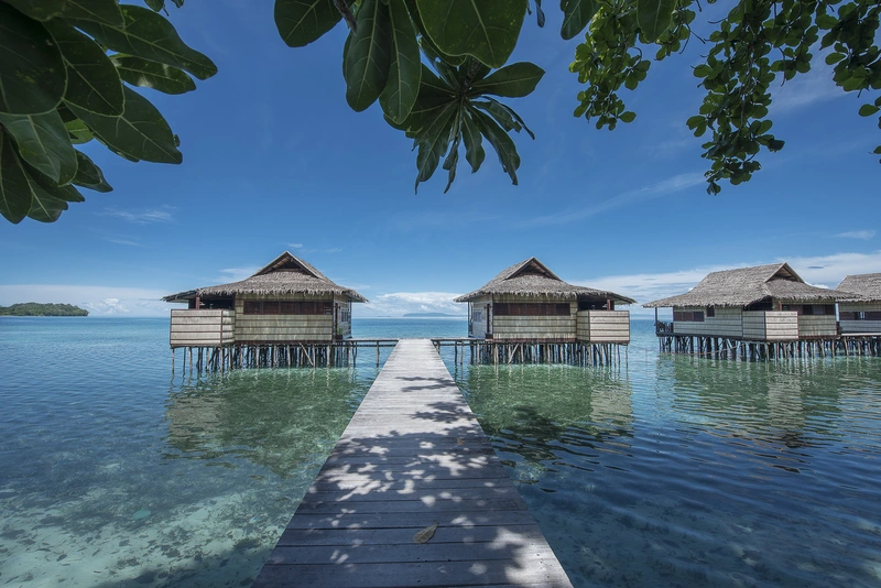 Premium over-water Deluxe bungalow positioned for prime sunset viewing.