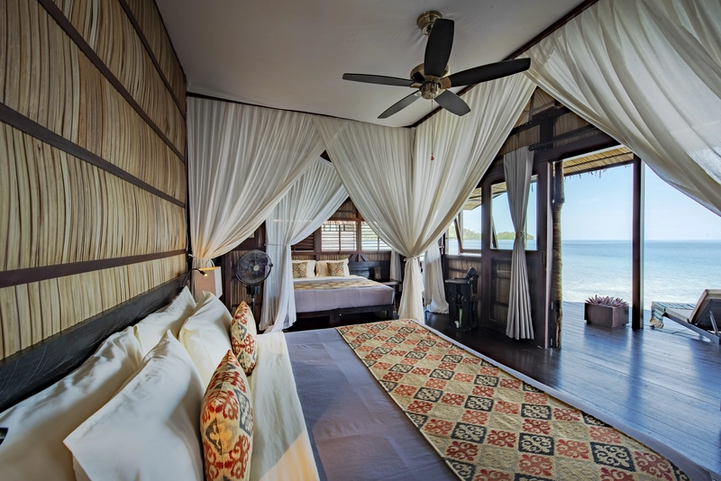 Cozy corner with couches inside the sophisticated Deluxe bungalow.