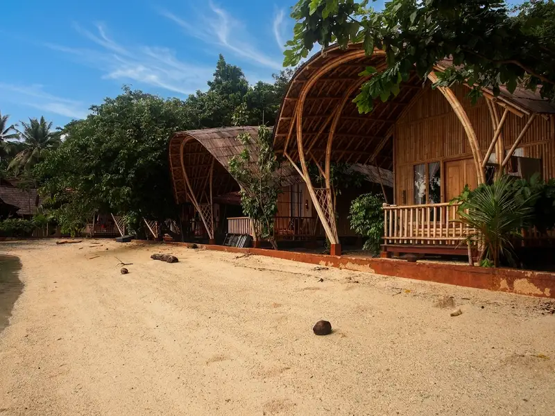 Sustainable bamboo architecture designed for a comfortable yet unhurried stay on remote Proco Island.