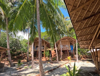 Seaview Garden Cottage in a lush tropical setting, set back from the shoreline for added privacy.