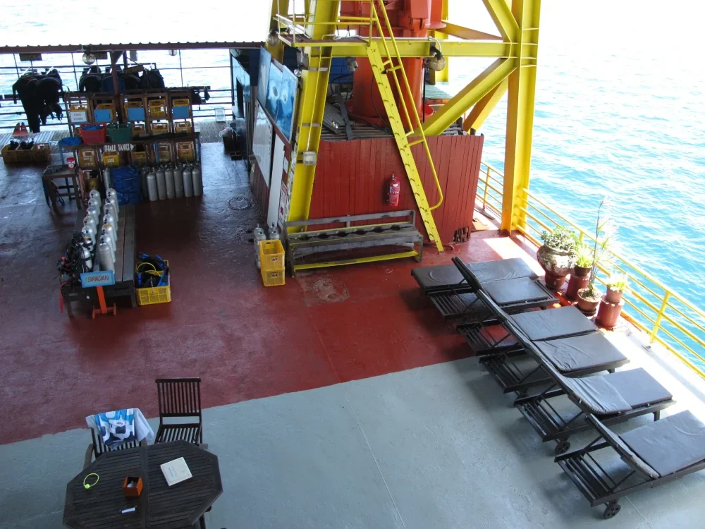 Open decks with views of Mabul and nearby islands.