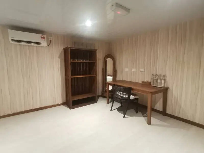 Dedicated workspace and desk area within the Deluxe room.