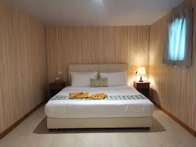 Well-appointed Deluxe cabin featuring a comfortable double bed.