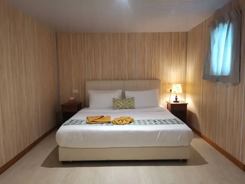 Well-appointed Deluxe cabin featuring a comfortable double bed.