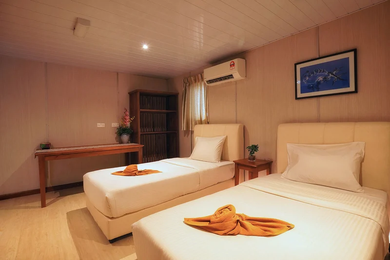Modern furnishings and storage space in the Deluxe cabin.