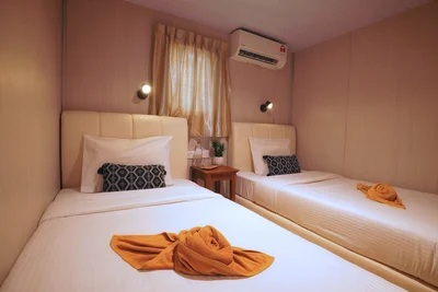 Compact and functional standard cabin interior, fully air-conditioned for comfort.