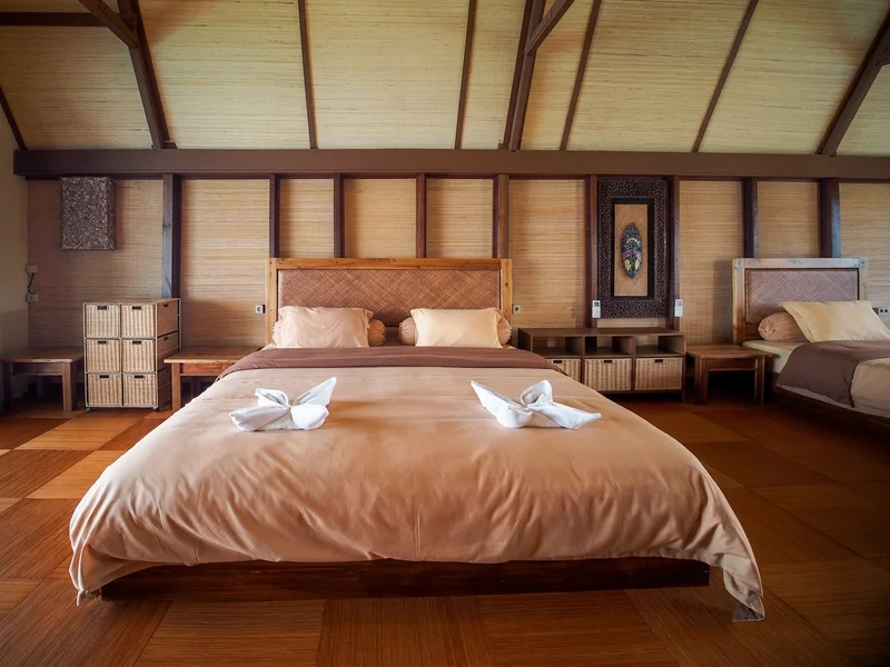 Bright and airy bedroom area using sustainable local materials.