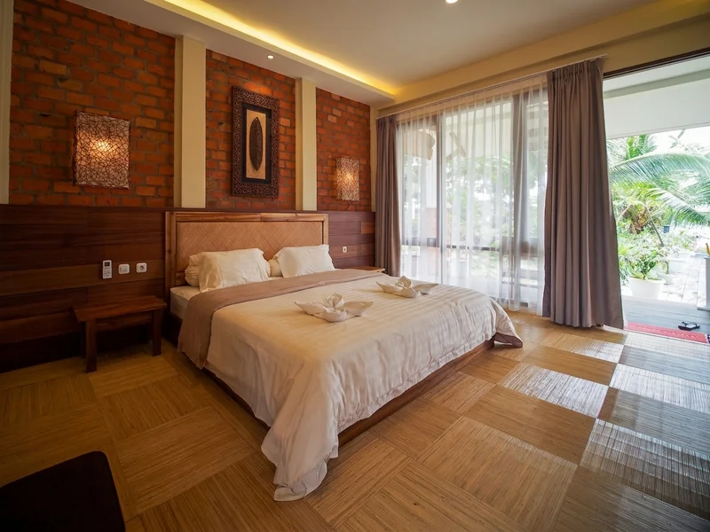 Well-appointed living space in the Sidau Cottage, designed for tropical comfort.