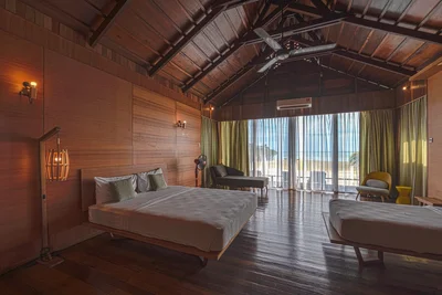 Traditional wooden interior of the over-water chalet.