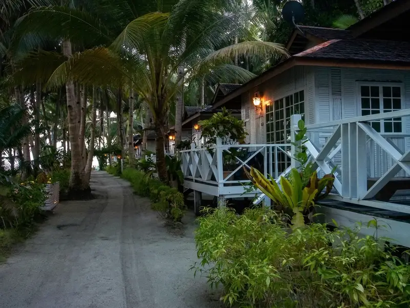 Signature wooden bungalow design reflecting the beauty of the Celebes Sea.