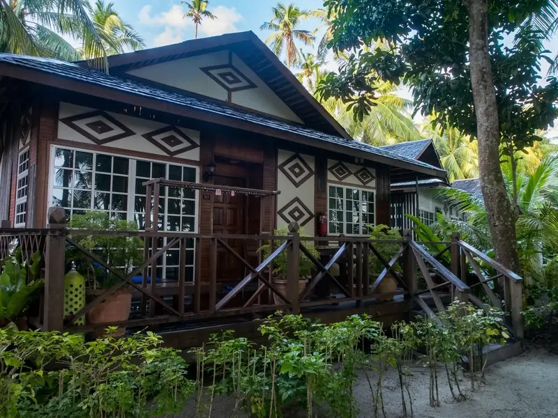 Premium suite bungalow set in a quiet and private corner of Mabul Island.