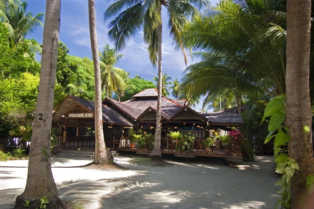 Sipadan-Mabul Resort, nestled among coconut trees in the quiet corner of Mabul Island.