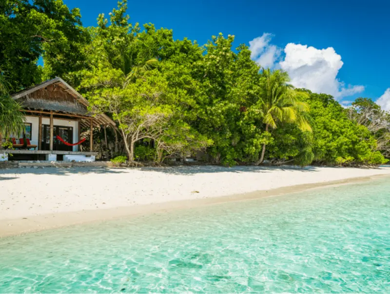 Beachfront view of the Sentani Cottages at Sorido Bay.