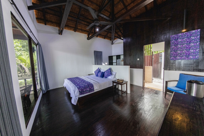 Traditionally designed interior of the Garden View Room with local wooden finishes.